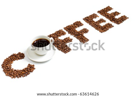 Coffee letters made of beans and cup isolated on white