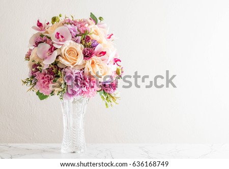 beautiful bouquet of flowers in vase Royalty-Free Stock Photo #636168749
