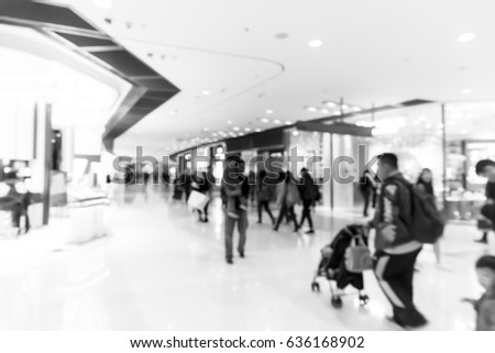 Abstract blur shopping mall interior and retail store for background with B&w tone