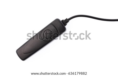 Remote control shutter switch of DSLR camera isolated on white background.