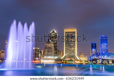 Jacksonville, Florida. City lights at night with river reflections.