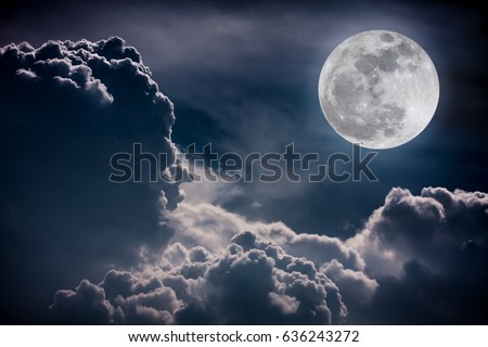 Nature background. Attractive photo of night sky with cloudy and bright super moon. The moon were NOT furnished by NASA.
