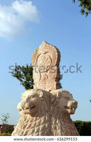 stone lion statues for decorate in the park .