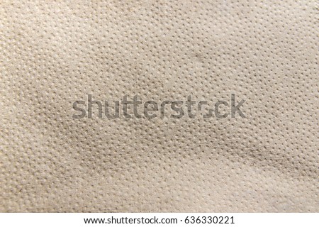 Background made of light brown napkin paper texture, three-dimensional embossing