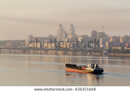 Ship sailing on the river in the morning at dawn. Dnepropetrovsk, Ukraine
