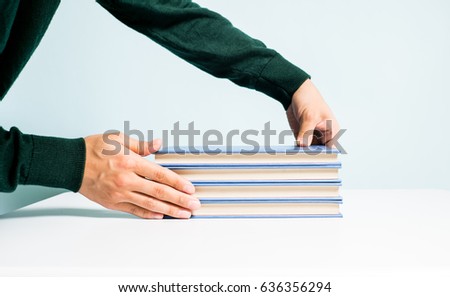 Man holding books