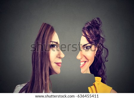 surrealistic portrait front with cut out profile of two women isolated on gray wall background