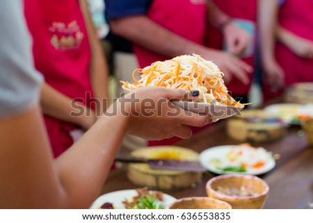 Bowl full of bean sprouts and carrot julienne. Picture of traditional thai cuisine made of fresh ingredients taken during cooking class in Chiang Mai.