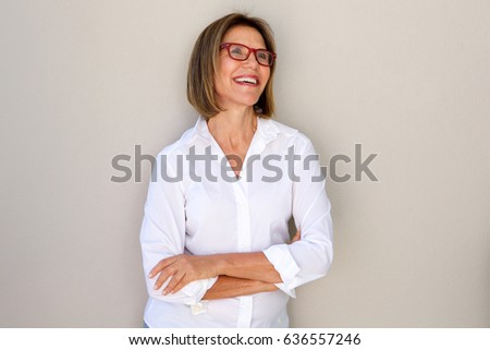 Portrait of business woman with glasses smiling  Royalty-Free Stock Photo #636557246