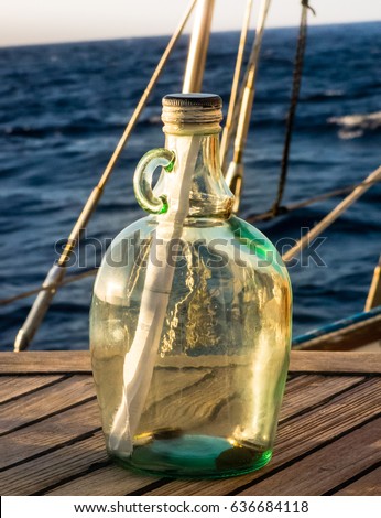 Message in a bottle ready to be thrown into the ocean.