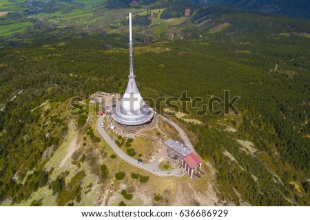 Aerial view of Jested tower on the top of Jested mountain 1 012 m (3,320 feet). Famous tourist attraction near Liberec in Czech republic, Europe. TV broadcast tower was built between 1963 and 1968.