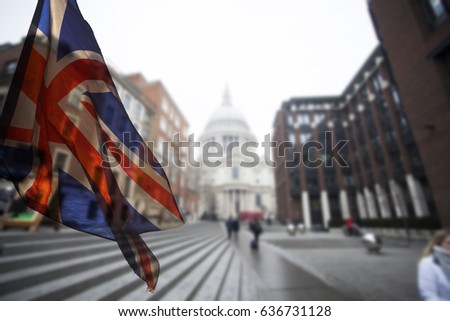  Union Jack flag and iconic London landmarks in the background - Brexit concept