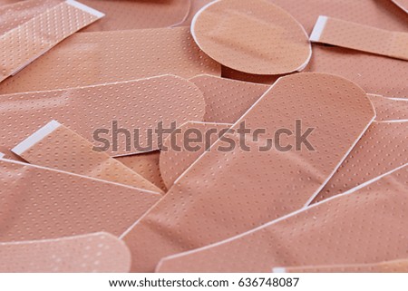 Adhesive plasters as background. Medical adhesive plaster pattern texture wallpaper for every concept.