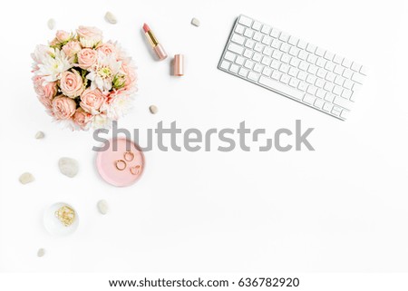 Top view office desk. Workspace with, laptop, bouquet roses, clipboard. Women's fashion accessories isolated on white background. Flat lay