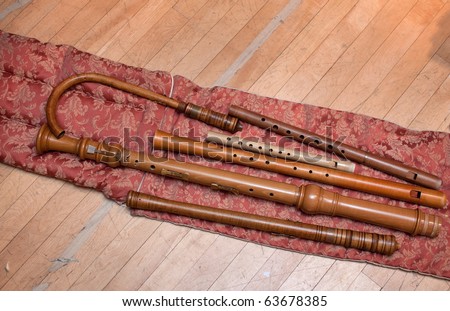 medieval woodwind instruments including a curved crumhorn, used for Jewish Sephardic Spanish music. Royalty-Free Stock Photo #63678385