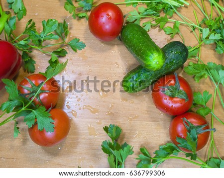 The healthy vegetables and herbs. Wooden background.