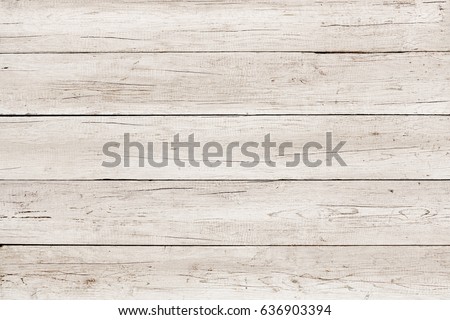 Old weathered wood surface with long boards lined up. Wooden planks on a wall or floor with grain and texture. Light neutral tones. Washed wood texture