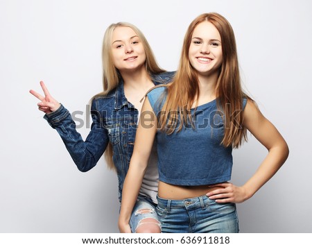 emotions, people, teens and friendship concept - two young teen 