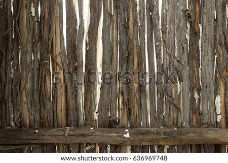 Old grungy wooden poles texture