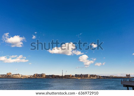 Boston shore, almost clear blue sky