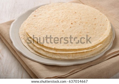 Stack of  wheat flat bread on the plate