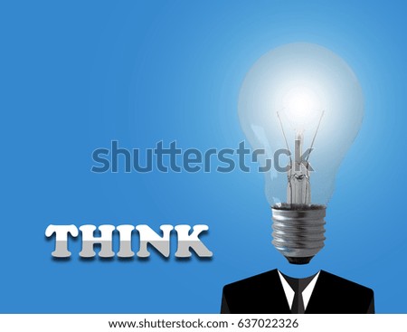 Think big concept, light bulb and business man on blue background