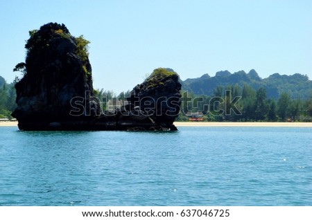 photos with landscape background tropical Islands of Malaysia in the Andaman sea with blue water, as the source for design, decorating, advertising, Desk