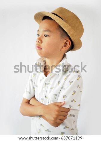 Asian boy is sulky. Royalty-Free Stock Photo #637071199