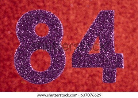 Number eighty-four purple color over a red background. Anniversary. Horizontal