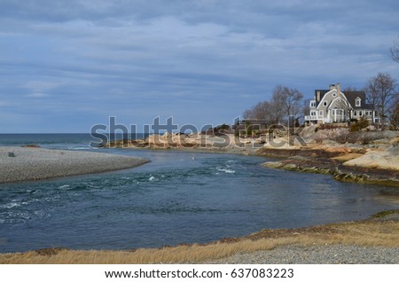House on coastal inlet in Cohasset Massachusetts. Royalty-Free Stock Photo #637083223