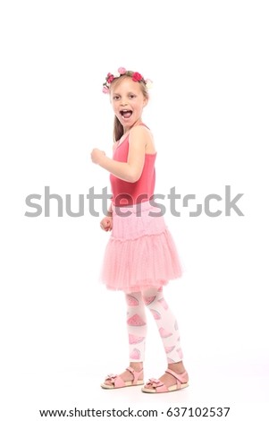 Beautiful little girl in front of a white background