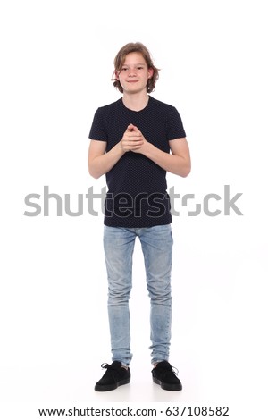 Teenage boy full body in front of a white background