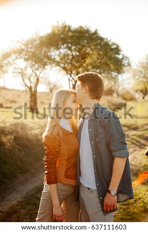 Happy smiling lovely couple. Lovely family. Summer honey moon. Smiling couple in love outdoors. Cuddling couple.  Love couple. Love kiss. 