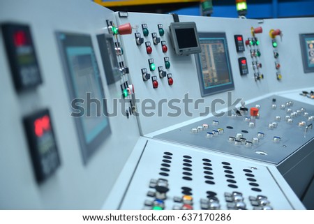 Electrical control panel with buttons and levers