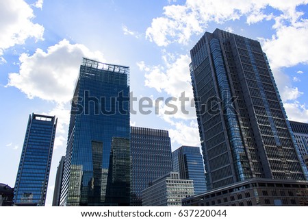 building in the cloudy blue sky