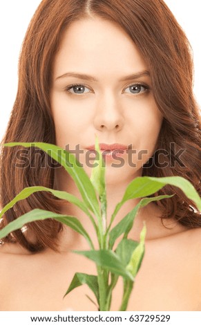 picture of woman with sprout over white