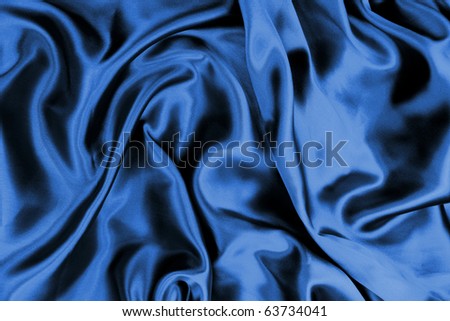Smooth elegant dark blue silk background