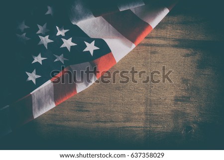 American flag close up on wood desk. Memorial day