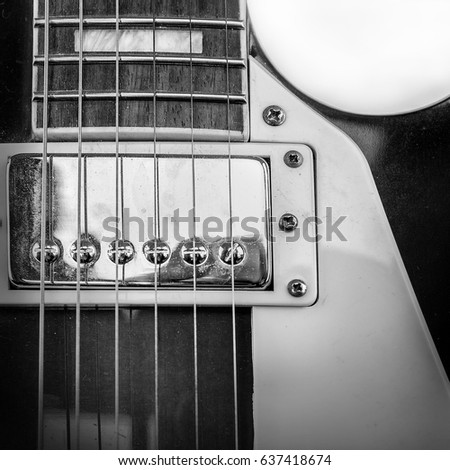 Rock guitar. Close-up view part of guitar, very popular musical instrument of the world.