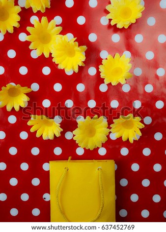 bright yellow bag for a cheerful red background.