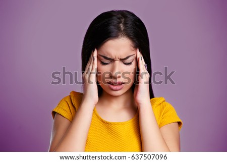 Woman with Migraine. Girl with Headache isolated Royalty-Free Stock Photo #637507096