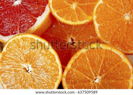 Half fruits. Fruit texture pattern as background.