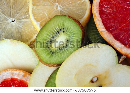 Half fruits. Fruit texture pattern as background.
