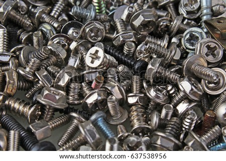 Nuts and bolts. Metal silver nut bolt screw background pattern or wallpaper for every concept.