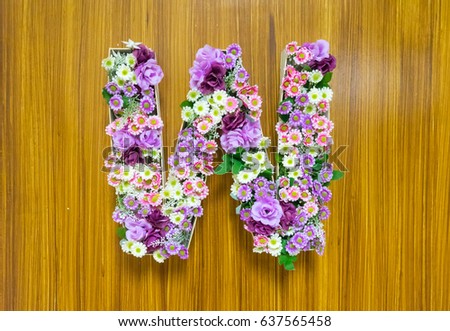 sign of toilet woman made from flower artificial or fake flower