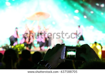 The audience shoots the party with a cell phone