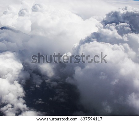 Cumulonimbus thunderstorm cloud creates dramatic 3D effect in high altitude