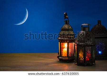 The Muslim feast of the holy month of Ramadan Kareem. Beautiful background with a shining lantern Fanus. Free space for your text Royalty-Free Stock Photo #637610005