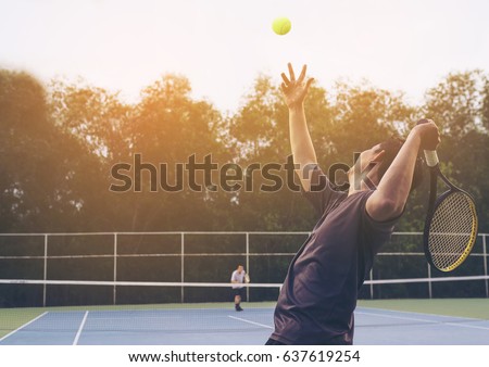 Tennis match which a serving player Royalty-Free Stock Photo #637619254