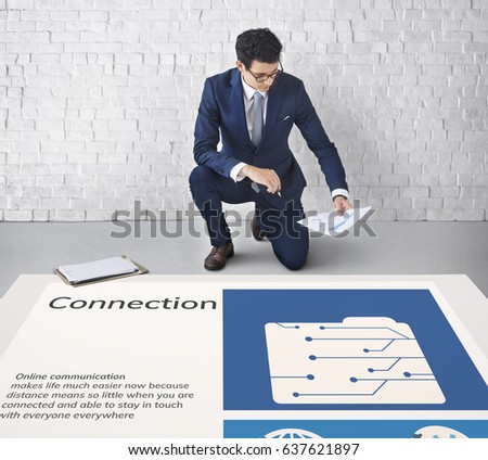 Man working on billboard network graphic overlay on floor